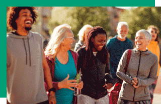 Group of people walking and laughing together