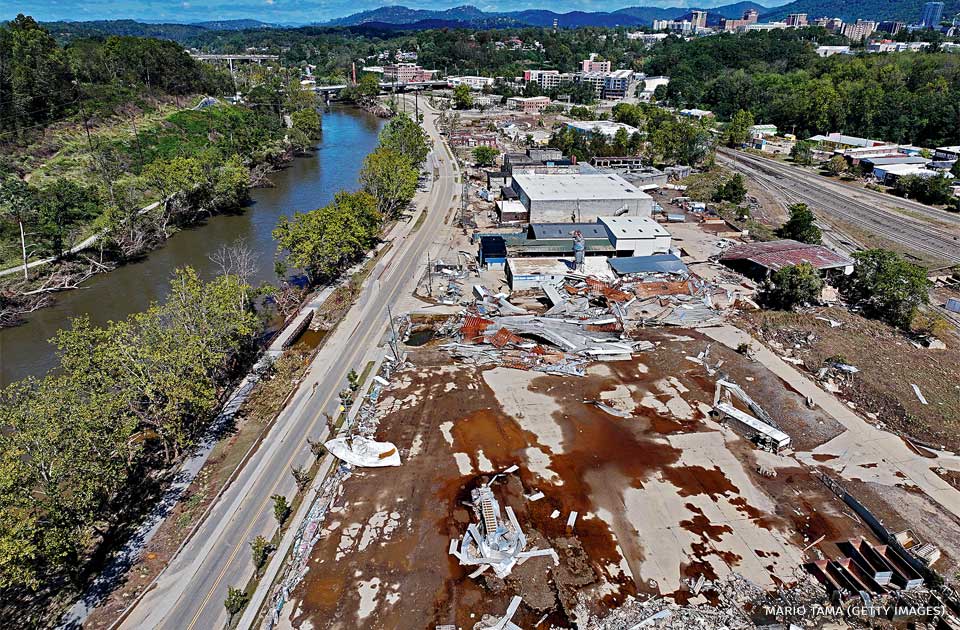 An aerial image of flood damage along the French Broad River in the aftermath of Hurricane Helene.